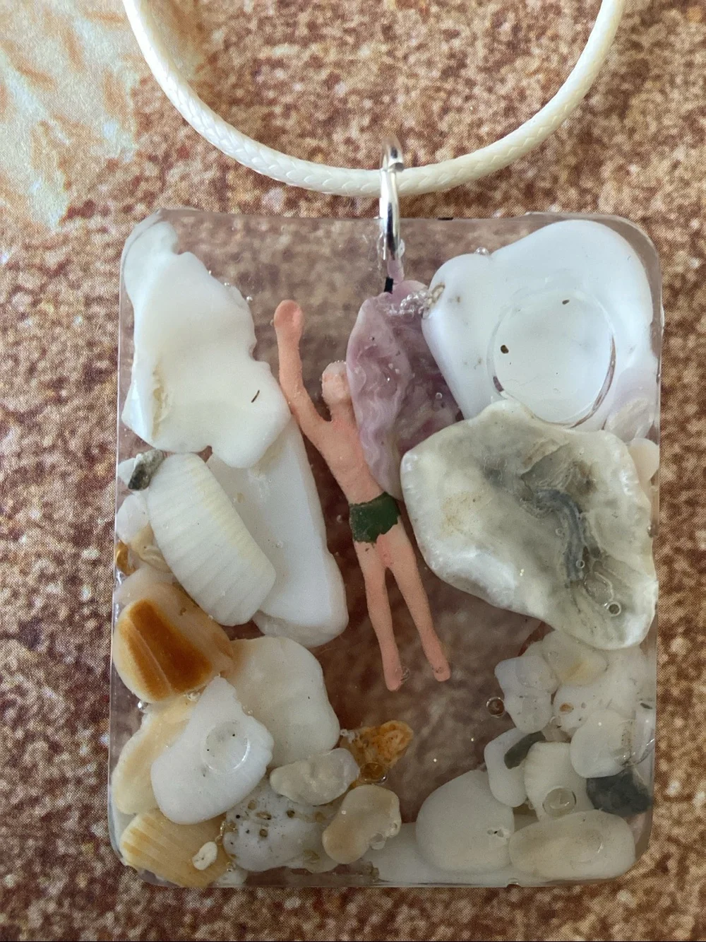 A tiny piece of summer to carry with you everywhere. Pendant-